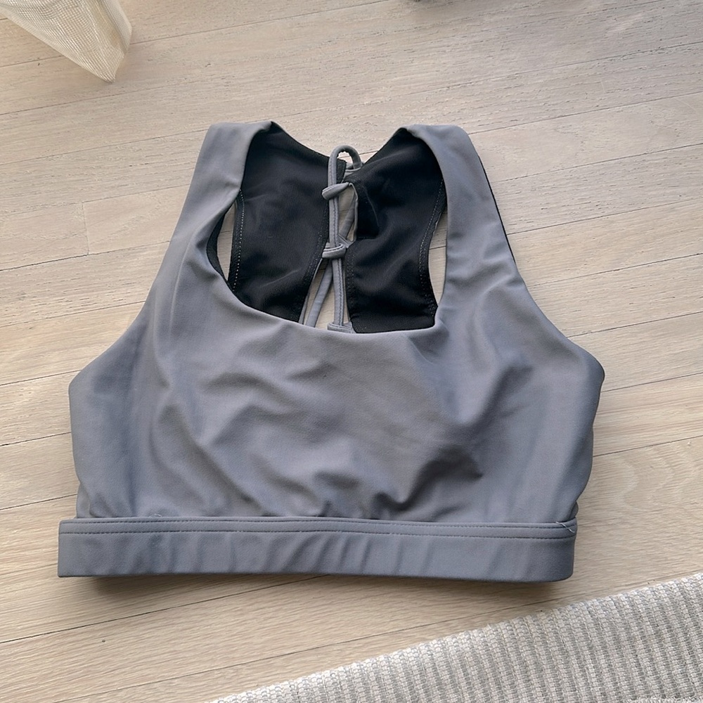 Grey Sports Bra. Open back
Criss- cross detail.